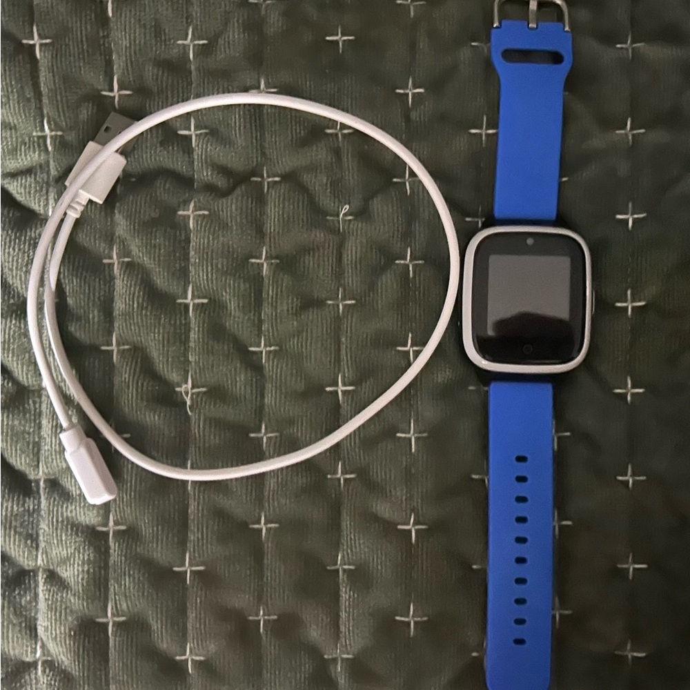 Blue Smartwatch with Charging Cable